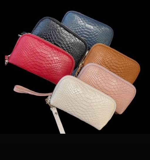 Six ladies leather wallets in croc-embossed leather: navy, black, red, tan, pink and cream